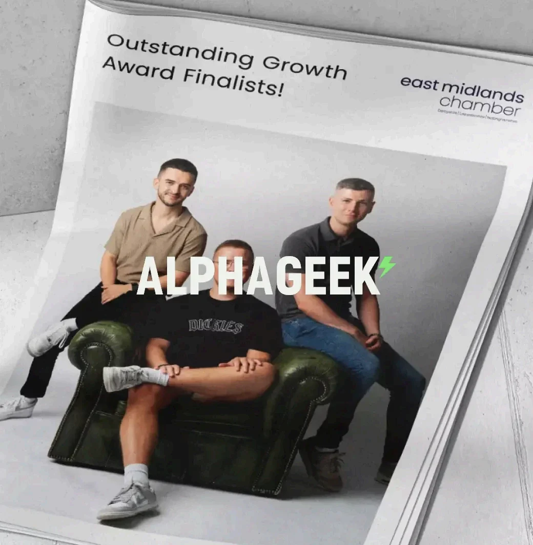The Alpha Geek team on a chair, under the words Outstanding Growth Award Finalists, East Midlands Chamber